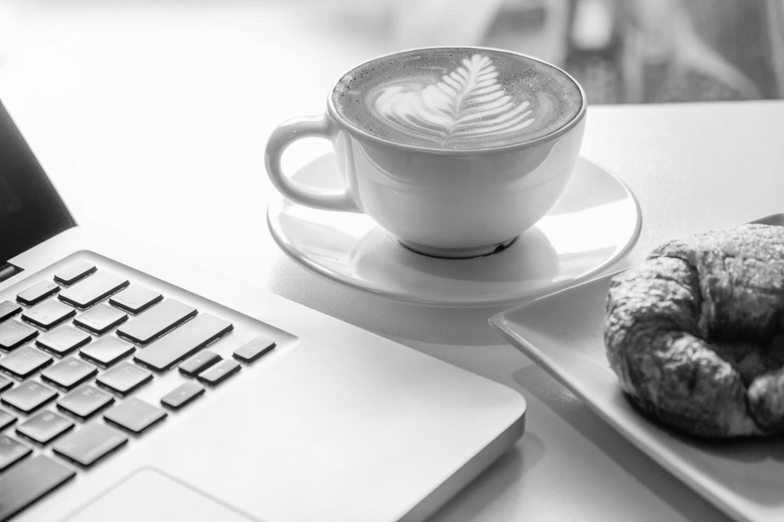 Journalist working with professional broadcast equipment in active newsroom